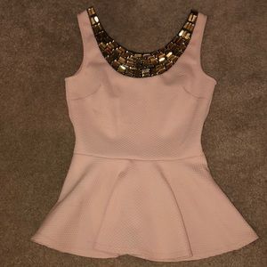Pink peplum top